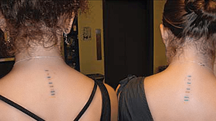 Jessica Stevens and Devin Columbus show off their matching protein standard tattoos