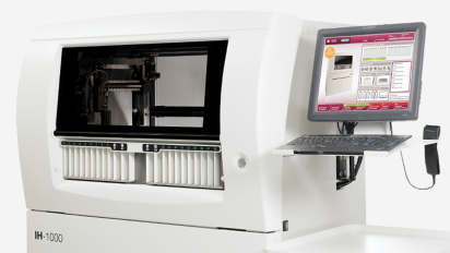'IH-1000' system featuring a central window and a right-side monitor with keyboard.